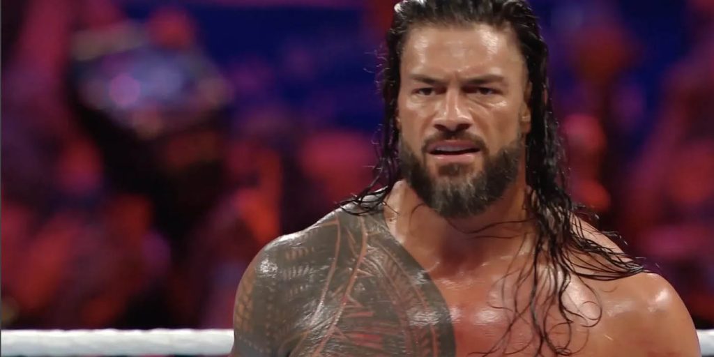 WWE Payback: Roman Reigns wins Universal title in first match back after  ring collapses